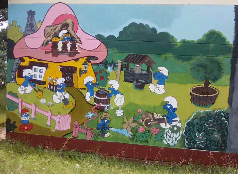 Another outside wall covered with a cartoon