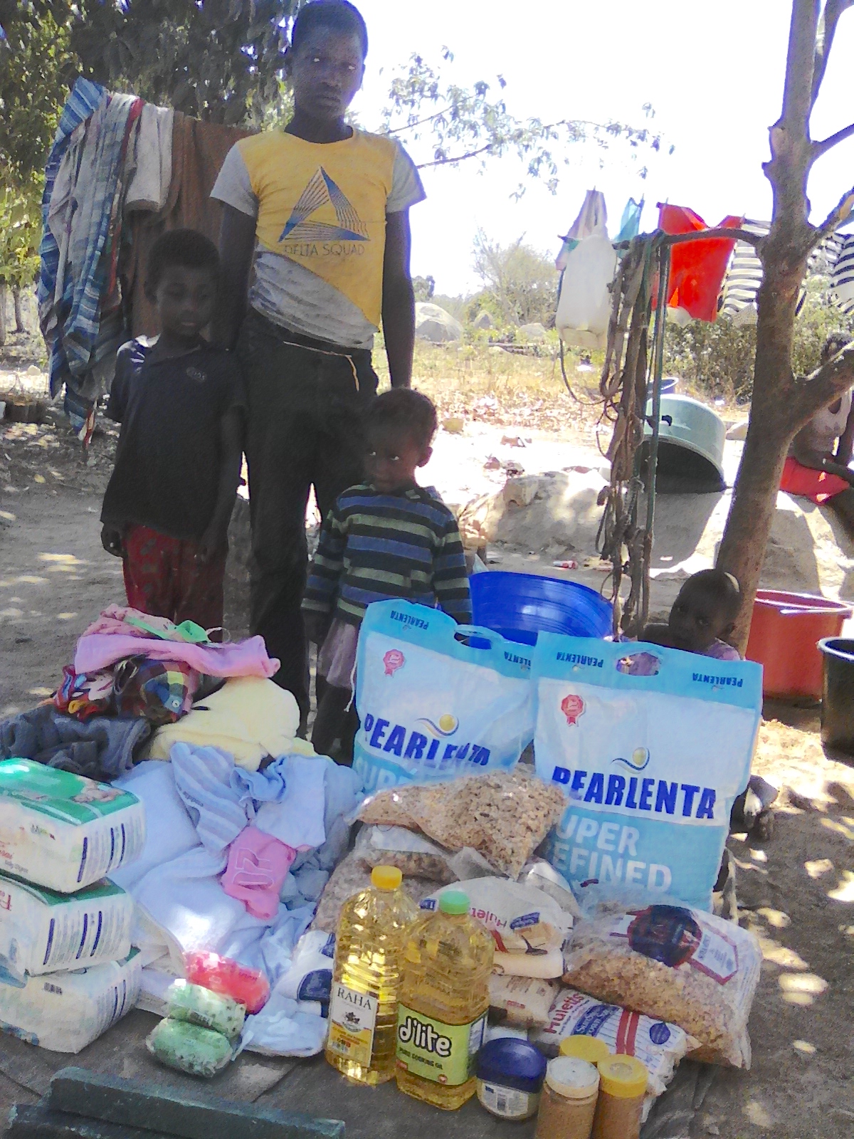 The family of 7 receives basic food and supplies from MRCH